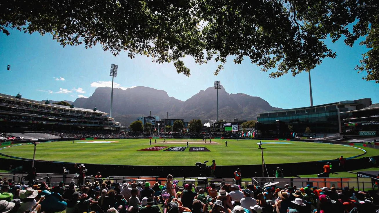 View from the stands at Newlands Cricket Ground, Cape Town, looking across the playing field towards Table Mountain.